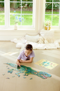 Puzzle de suelo brillante Dinos - Hape